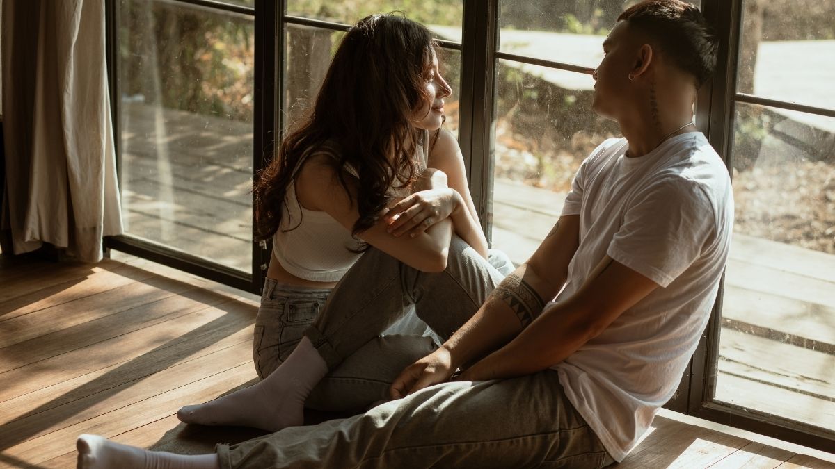 Couple talking at home
