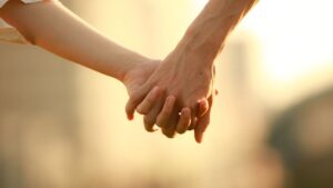 Couple holding hands