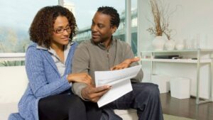 Man and woman reviewing prenup