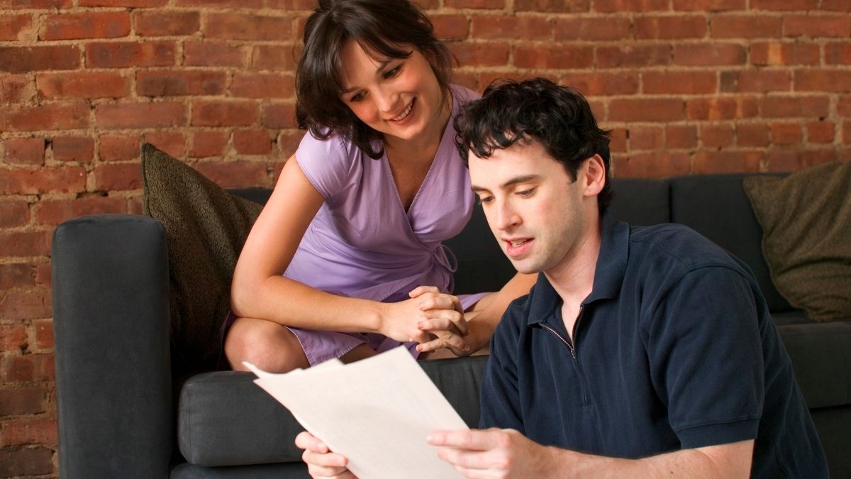 Couple with paperwork